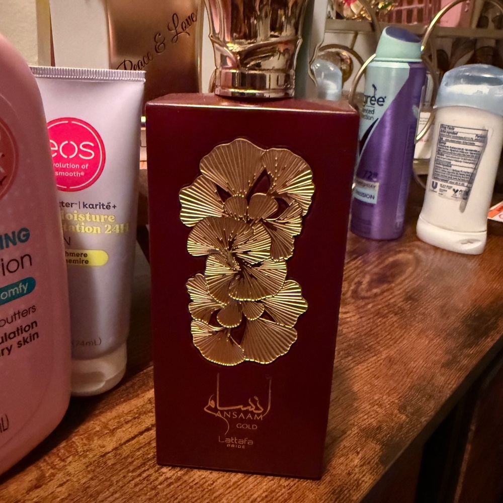 Lattafa Ansam Gold Perfume for Women - Elegant Gold and Red